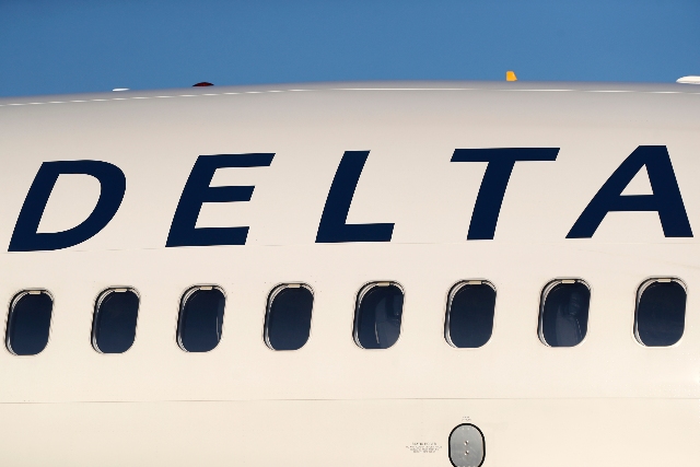 Man, Woman, Dog Flee Taxiing Airplane Using Emergency Slide