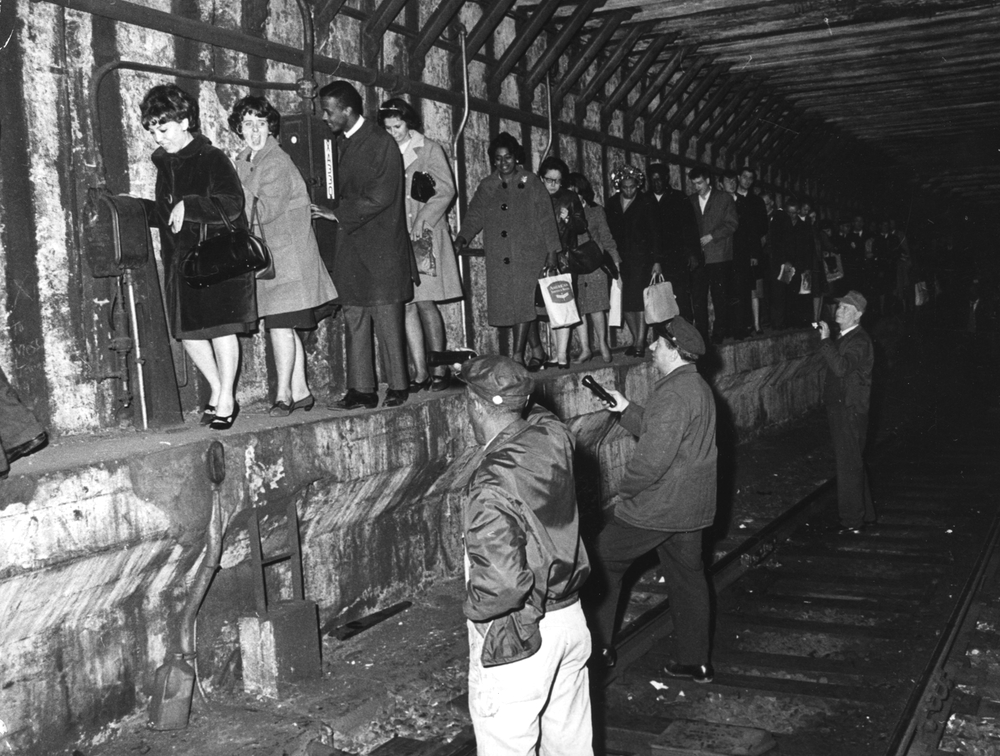 Chess champion Bobby Fischer working on his moves during a subway