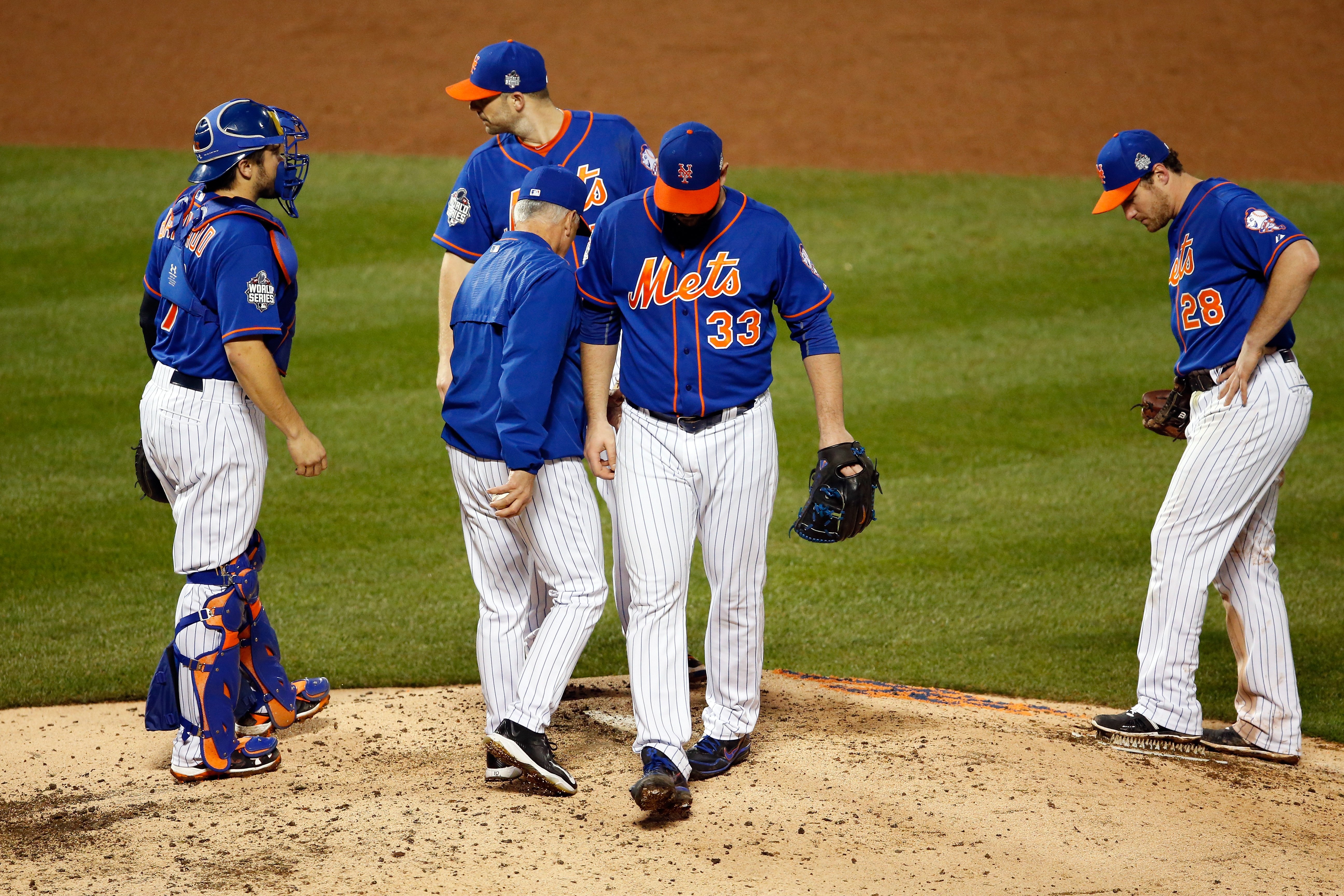 New York Mets starting pitcher Matt Harvey is taken out of the game after  giving up a double to Kansas City Royals Eric Hosmer (not show) in the  ninth inning of game