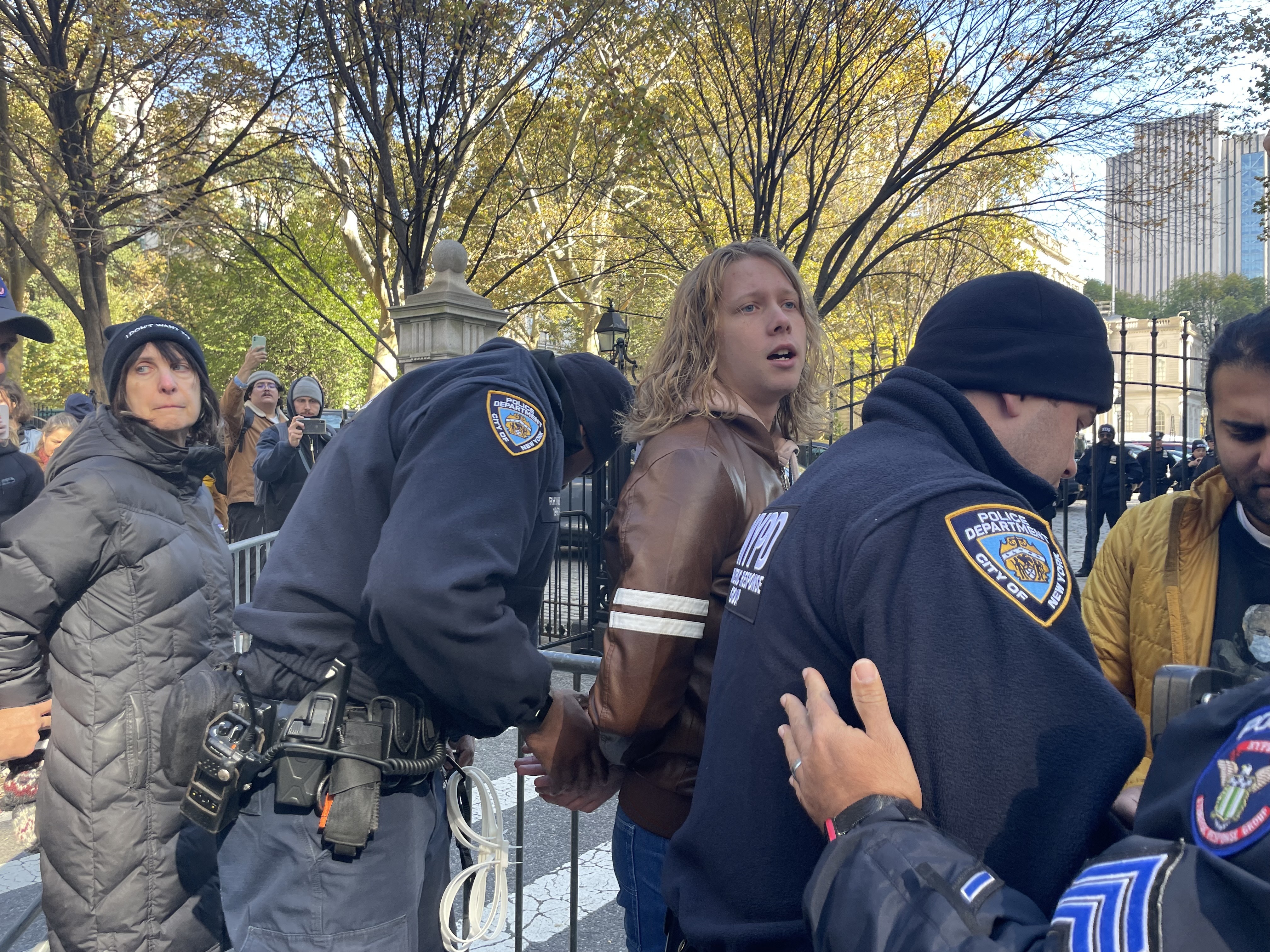 Climate protesters arrested at City Hall rally to oppose weakening of major NYC law