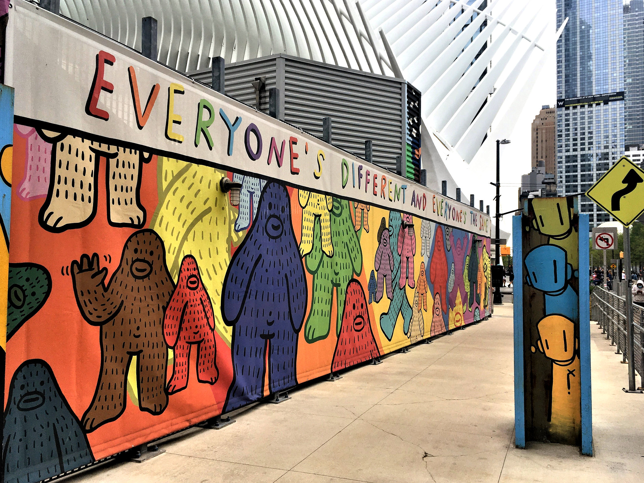 A photo of a mural by Brandon Sines near the Oculus