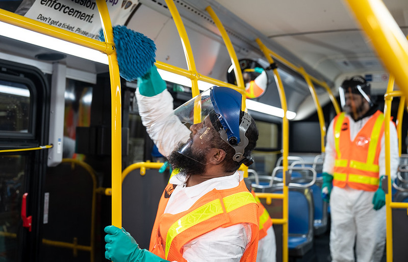 MTA workers disinfect a bus in March.
