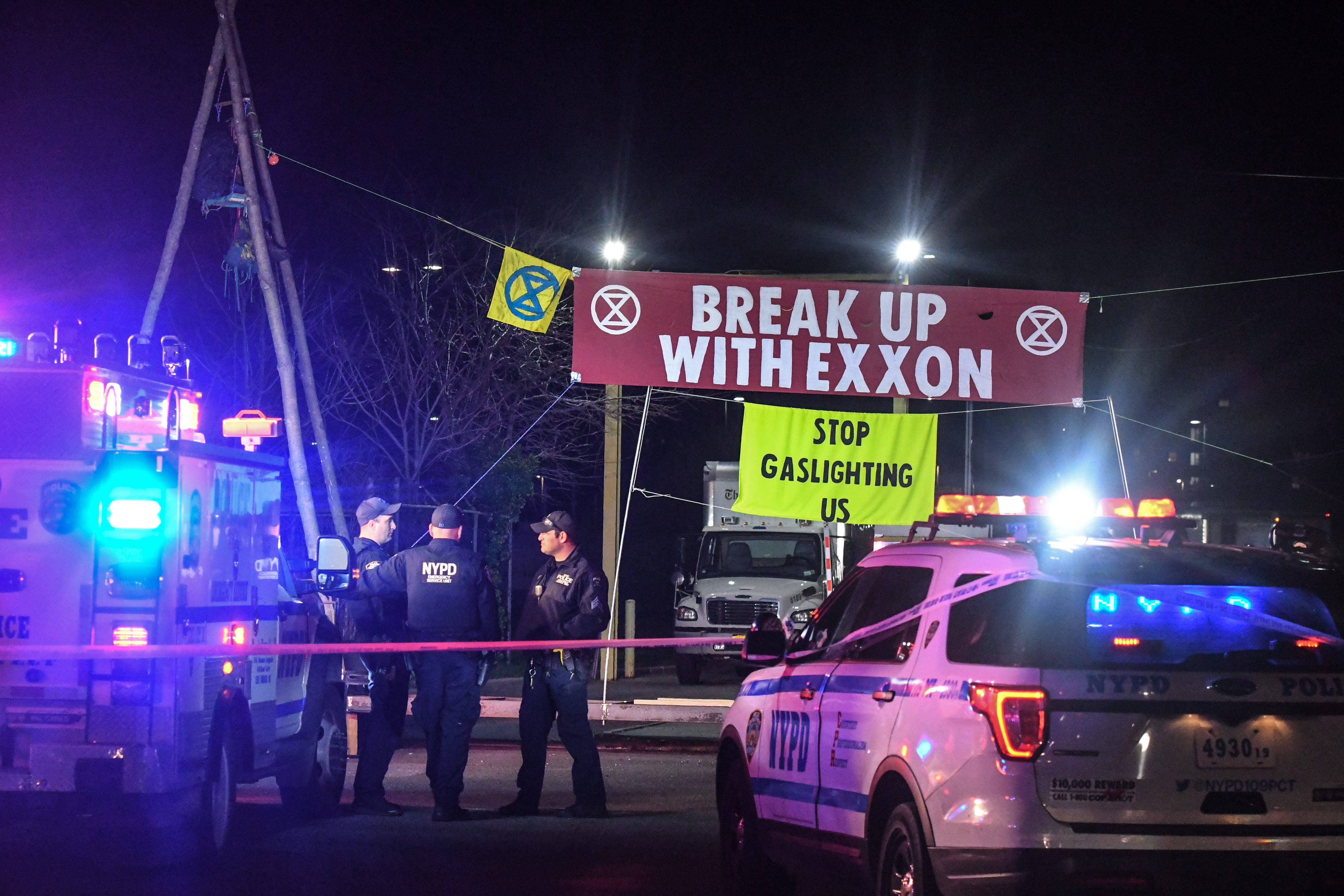 Thirteen climate activists arrested outside New York Times paper distribution hub in Queens