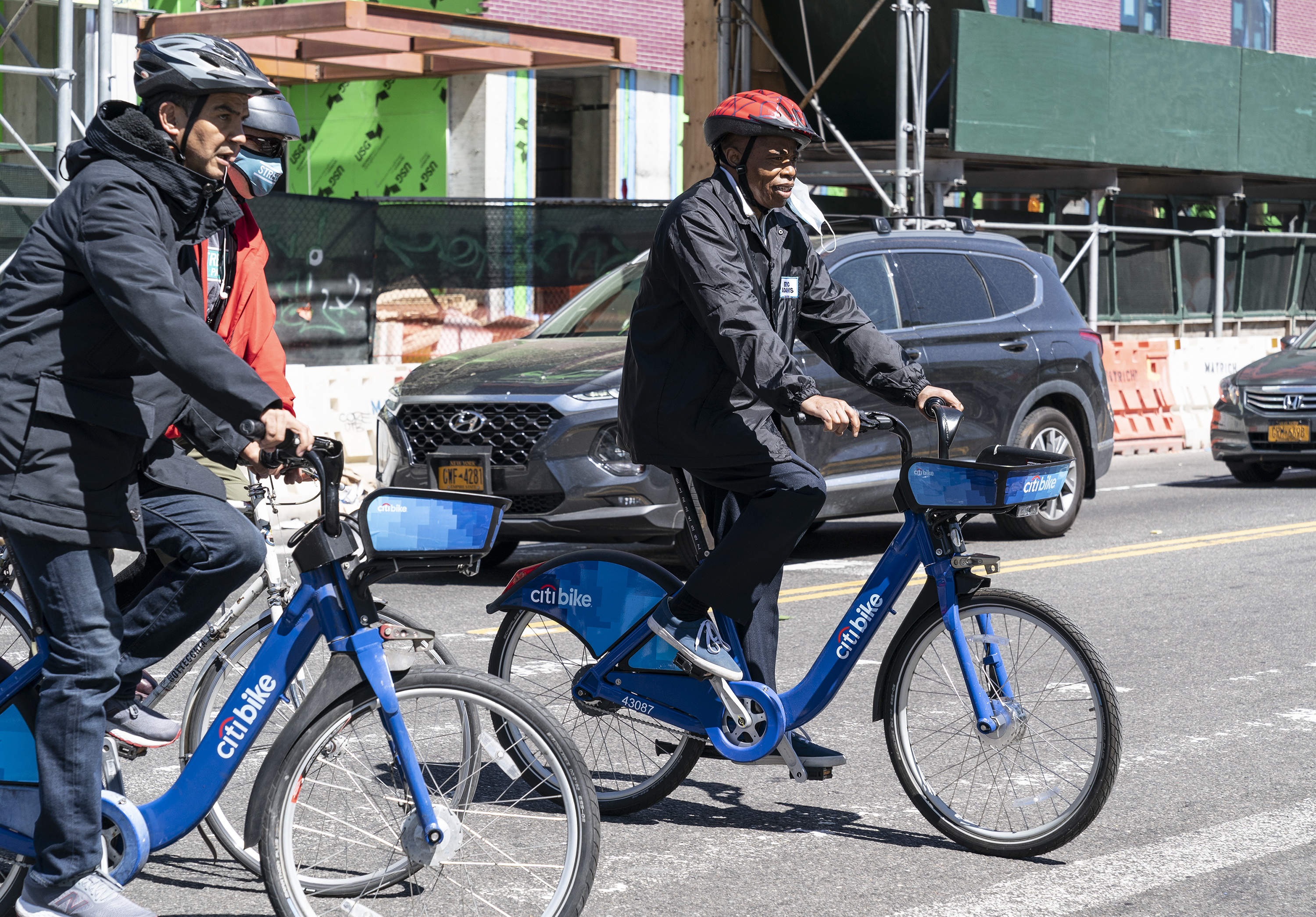 Mayor Eric Adams and Department of Transportation Commissioner Ydanis Rodriguez ride bikes.