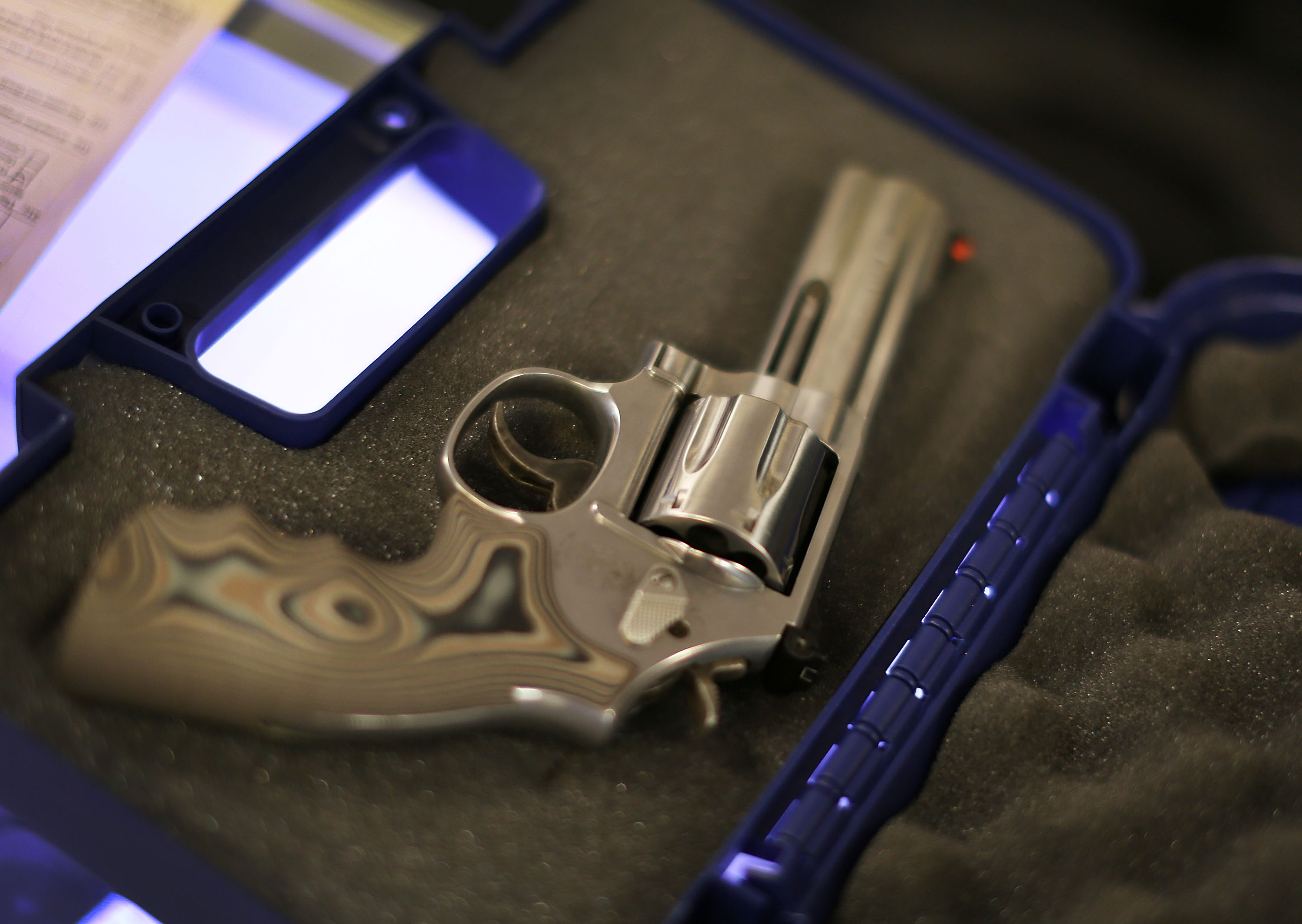 A handgun in its case.