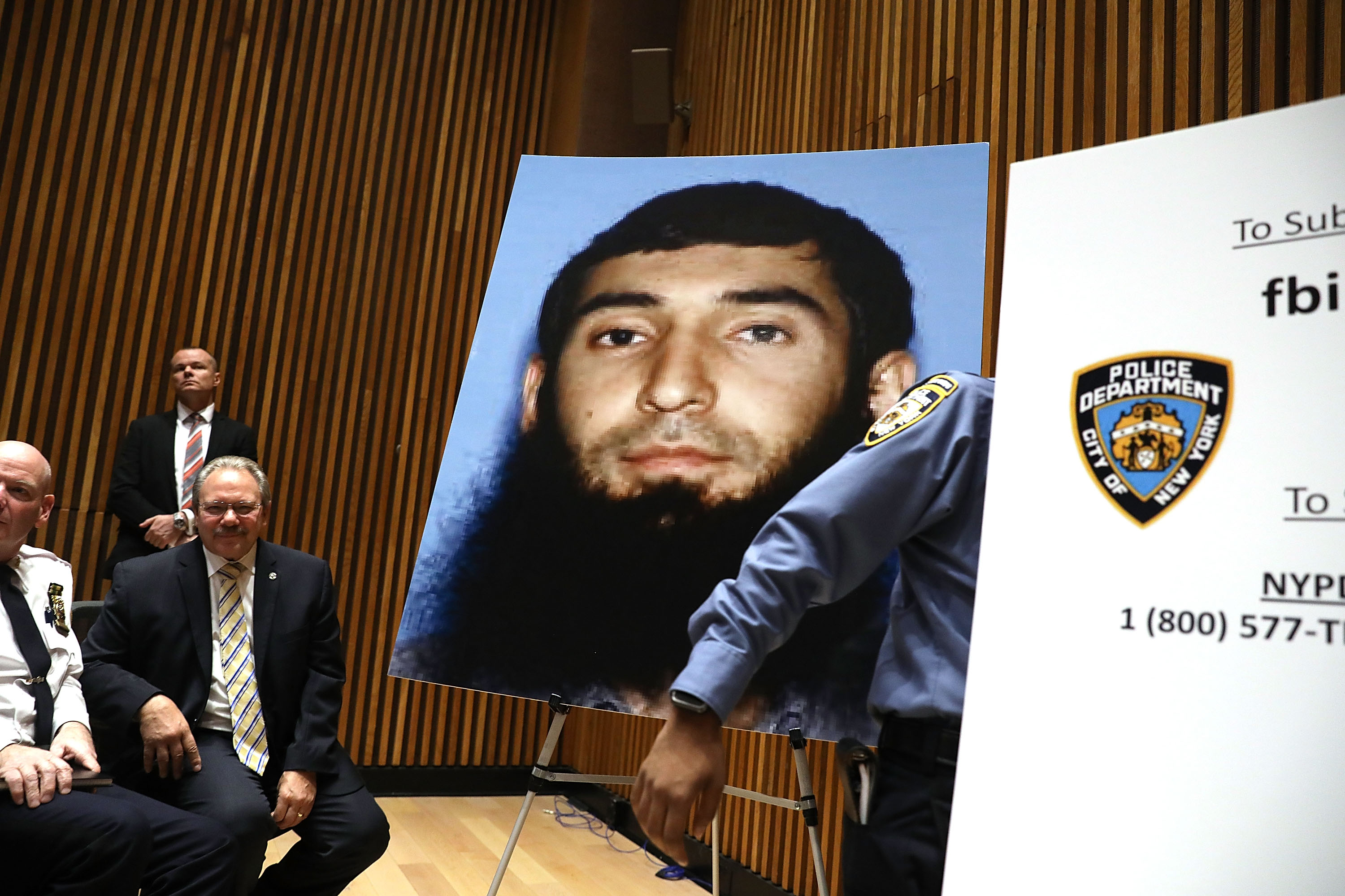 A picture of suspect Sayfullo Saipov is displayed during a news conference in 2017.