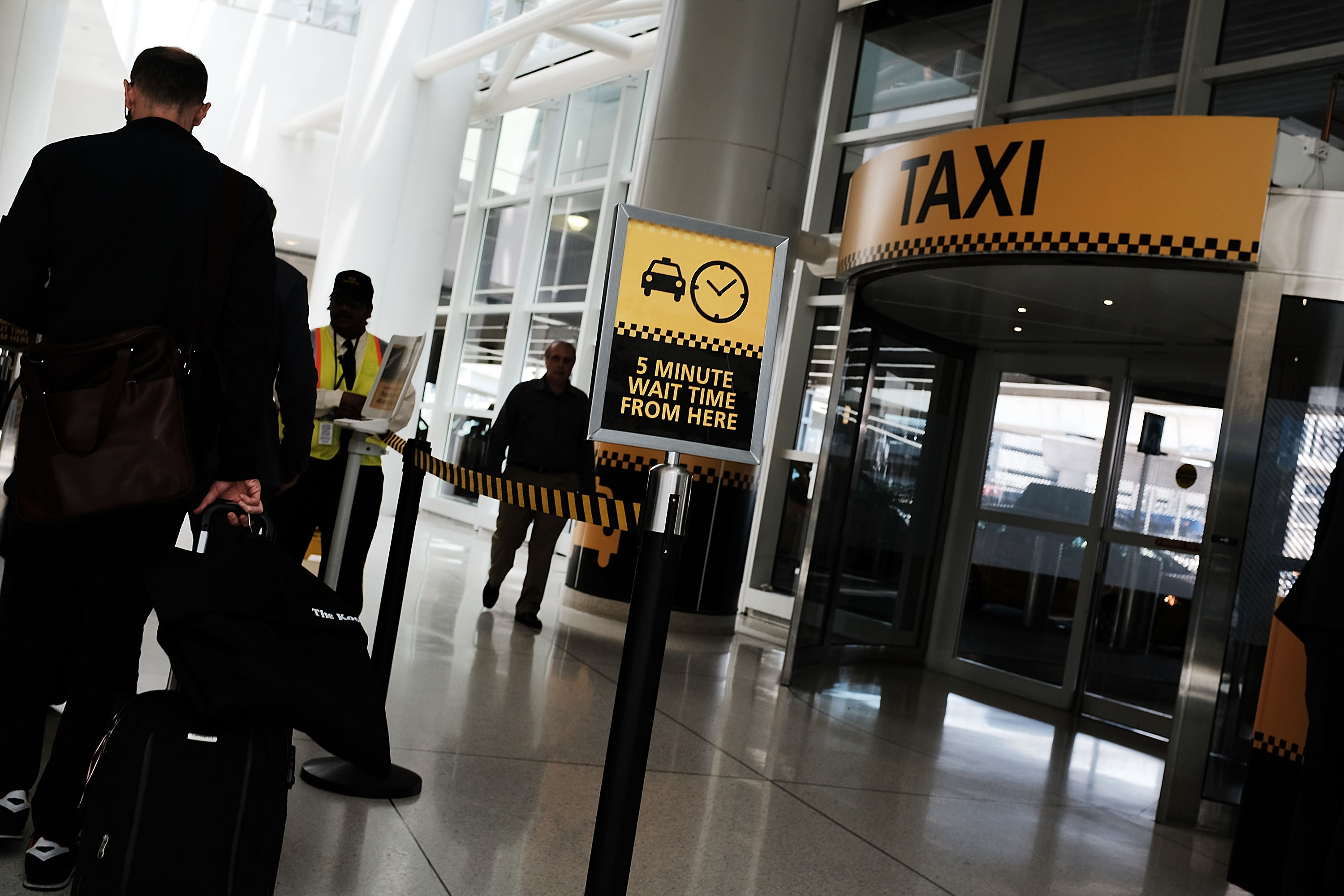 Taxi dispatchers charged with taking bribes from cabbies at JFK Airport