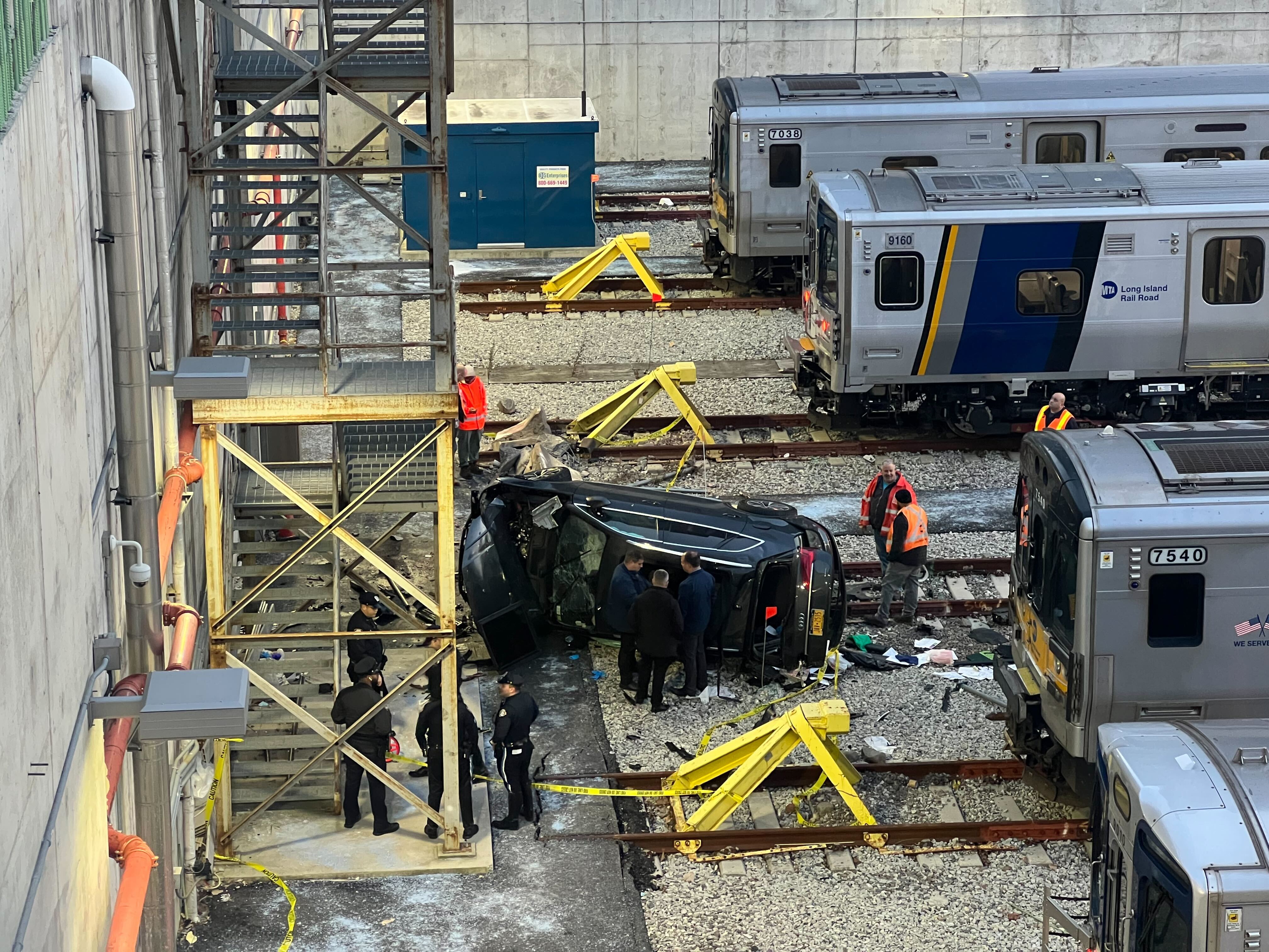 Man dead, woman critically injured after car plunges into Brooklyn rail yard Man dead, woman critically injured after car plunges into Brooklyn rail yard