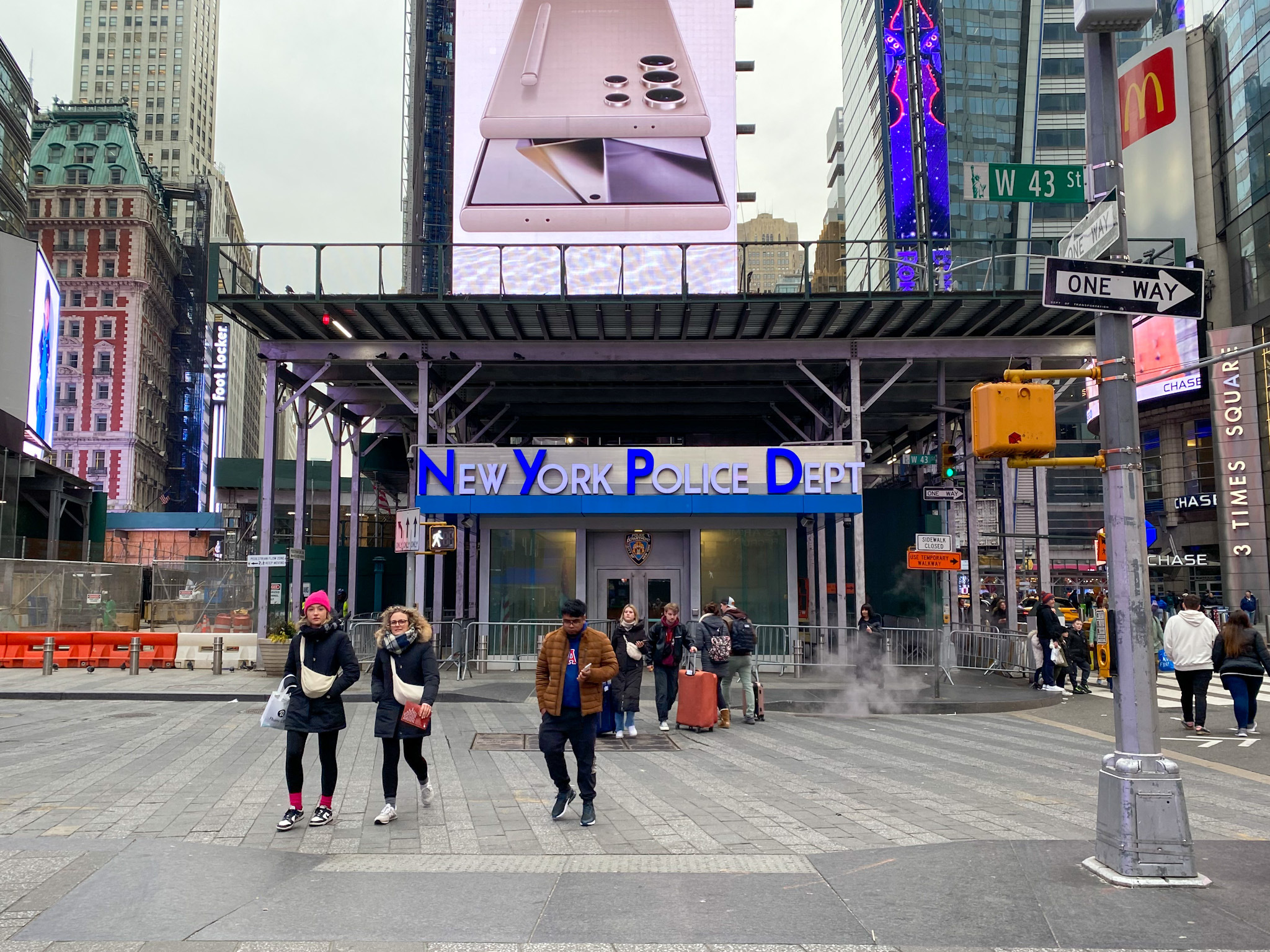 Tourists still throng Times Square, but 2 recent crimes leave some locals feeling stressed