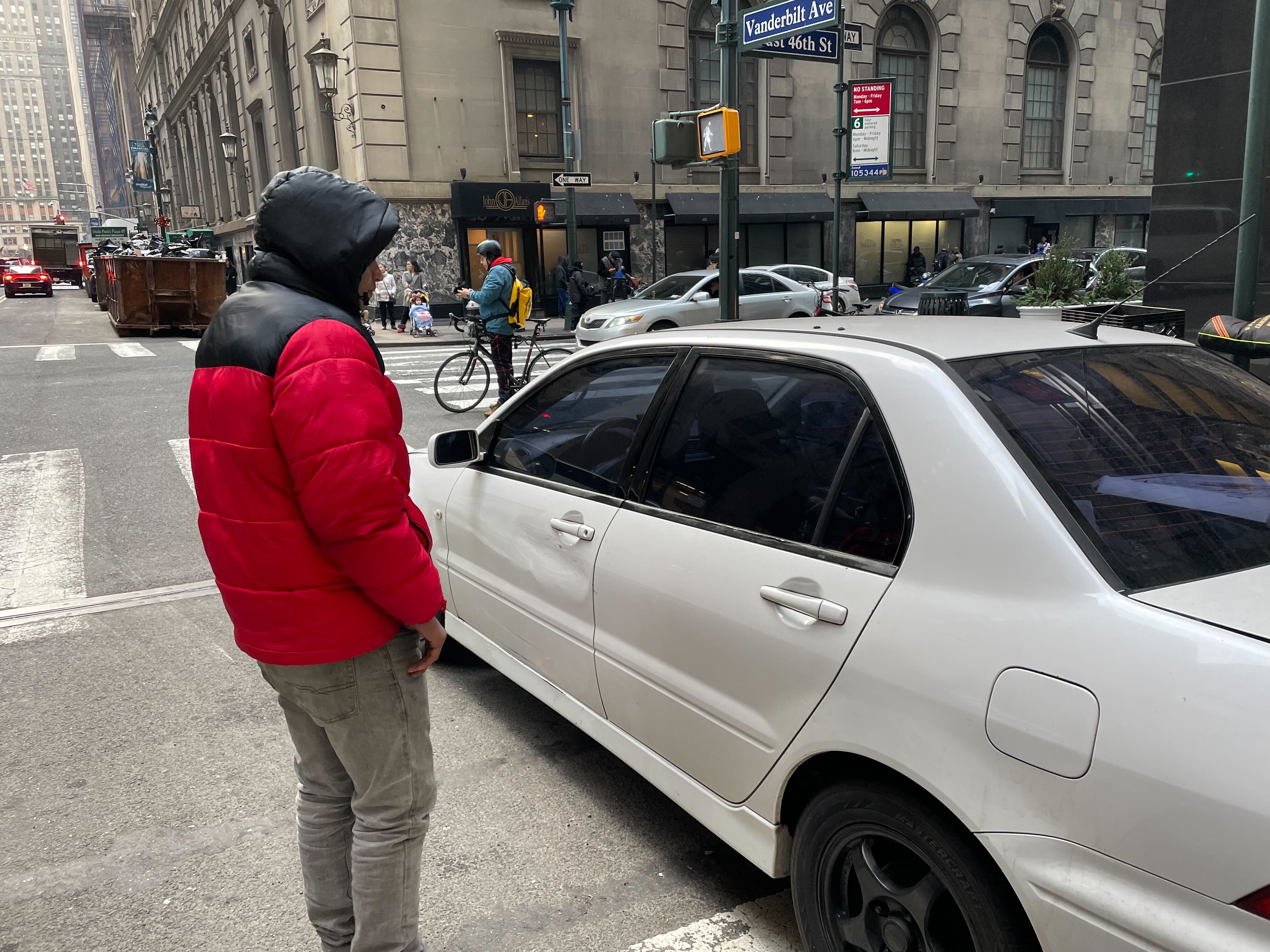 Migrants sleep in cars parked outside Roosevelt Hotel: &lsquo;I&rsquo;m stuck here, my car is broken&rsquo;