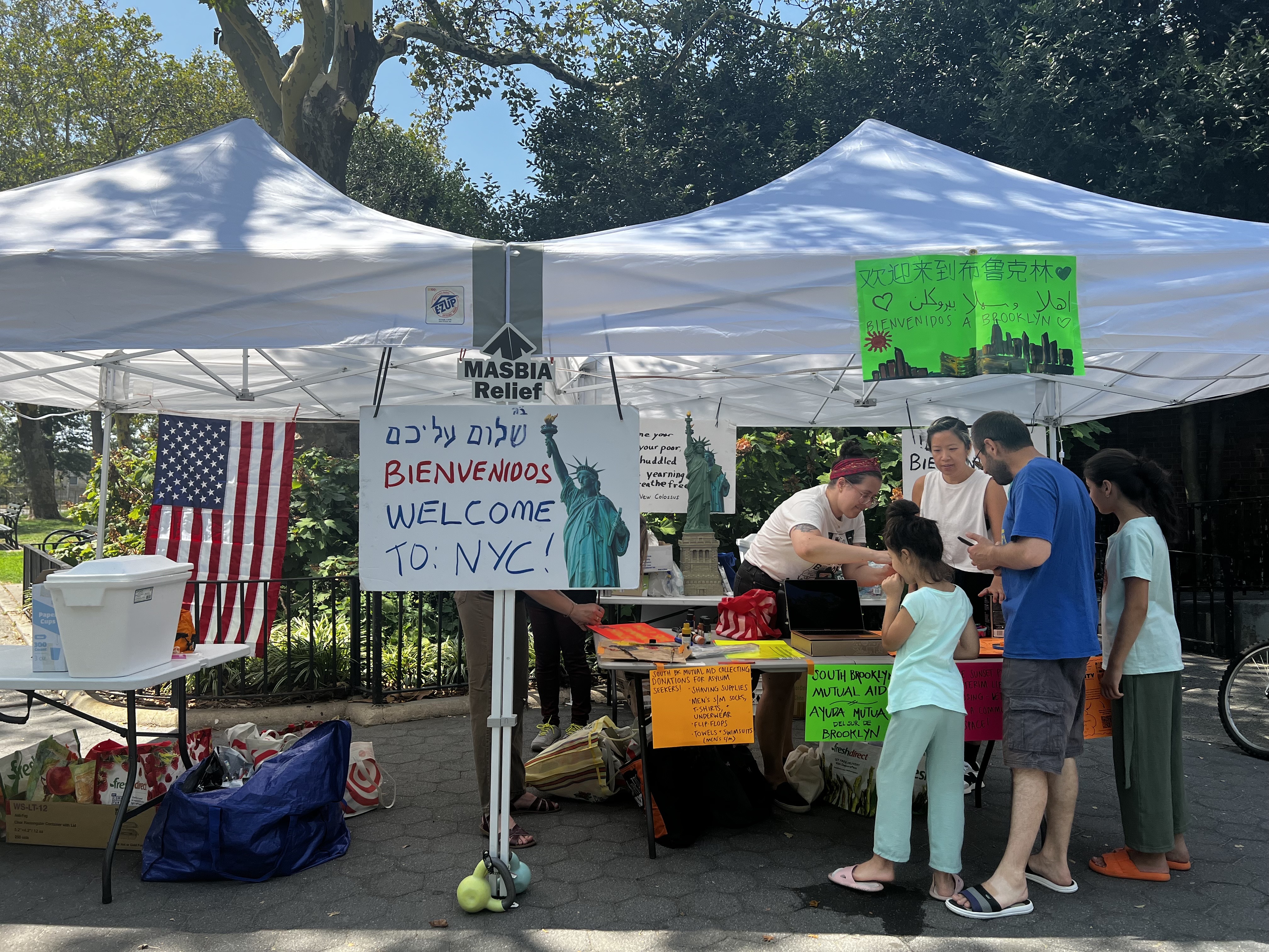 New migrant respite center in Sunset Park draws opposition from first-generation immigrants