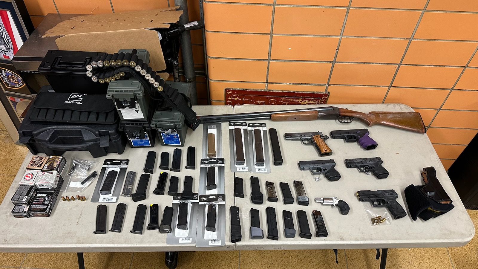 Two Queens men charged with stockpiling dozens of firearms, including ghost guns