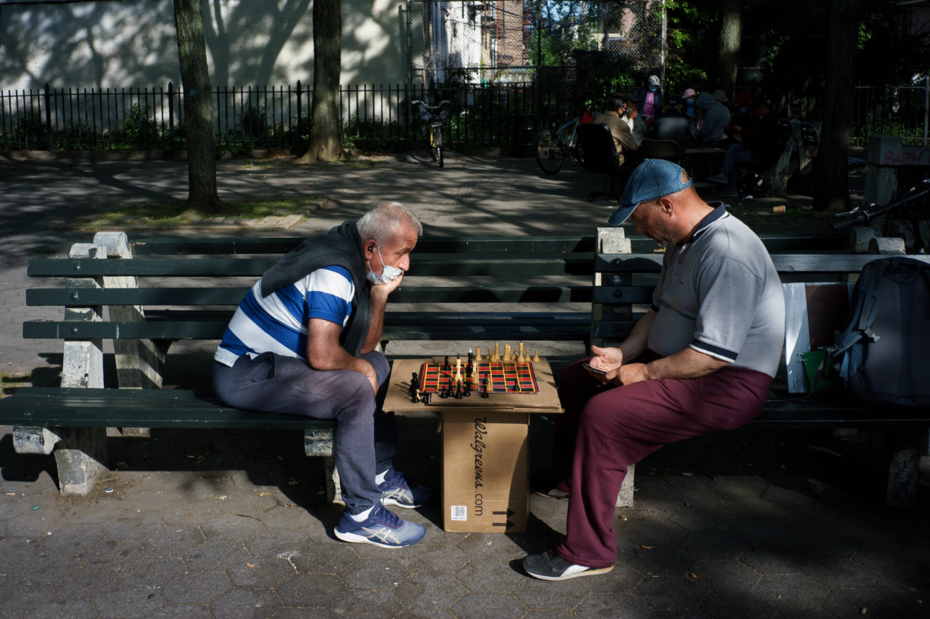 A photo of people playing chess in Bensonhurst