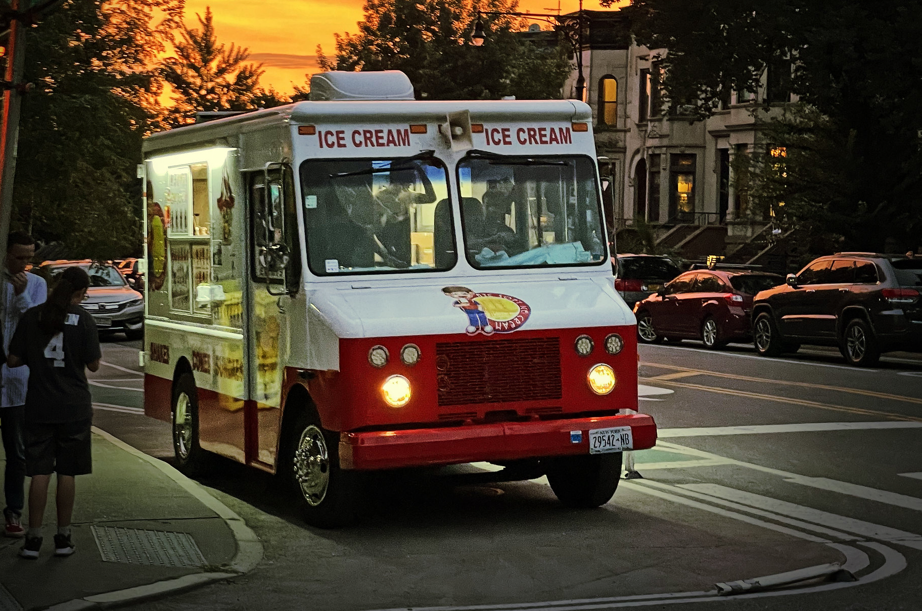 an ice cream truck at sunset