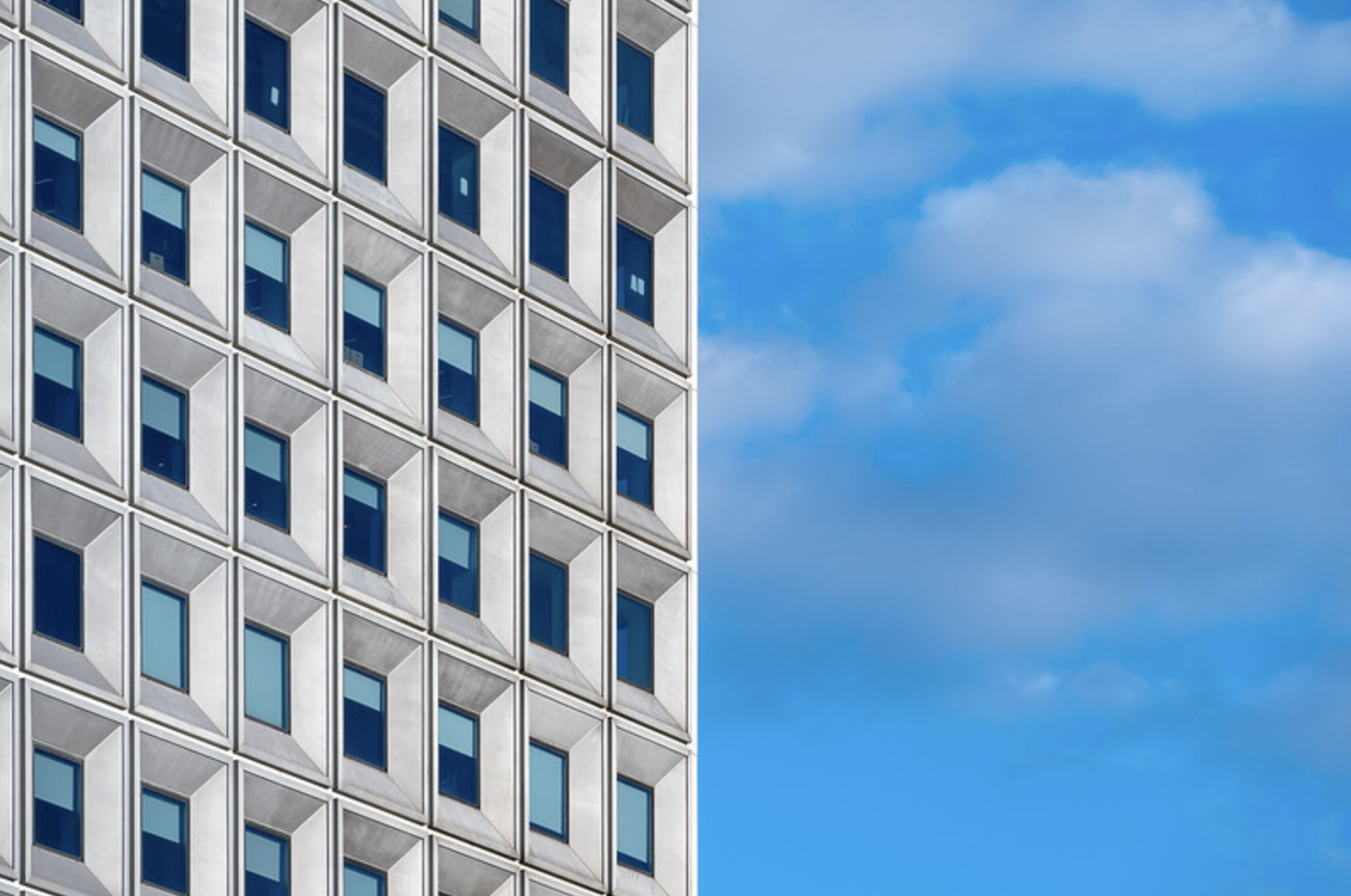 a modern building against a blue sky
