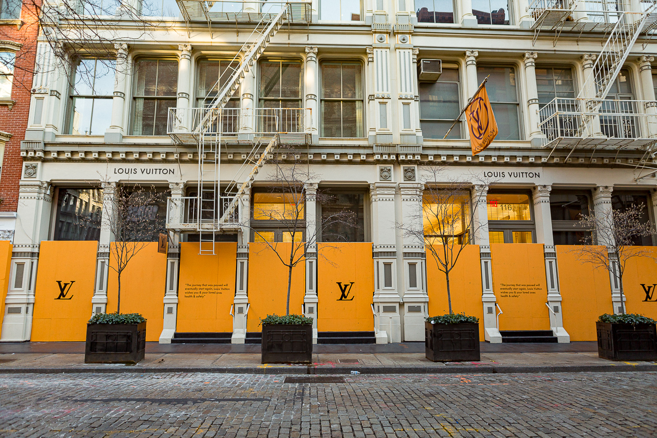 COVID-19 Affects to New York Business. Hopeful messages on the barricade  board at storefront of Louis Vuitton SOHO store in the Saturday afternoon  Stock Photo - Alamy