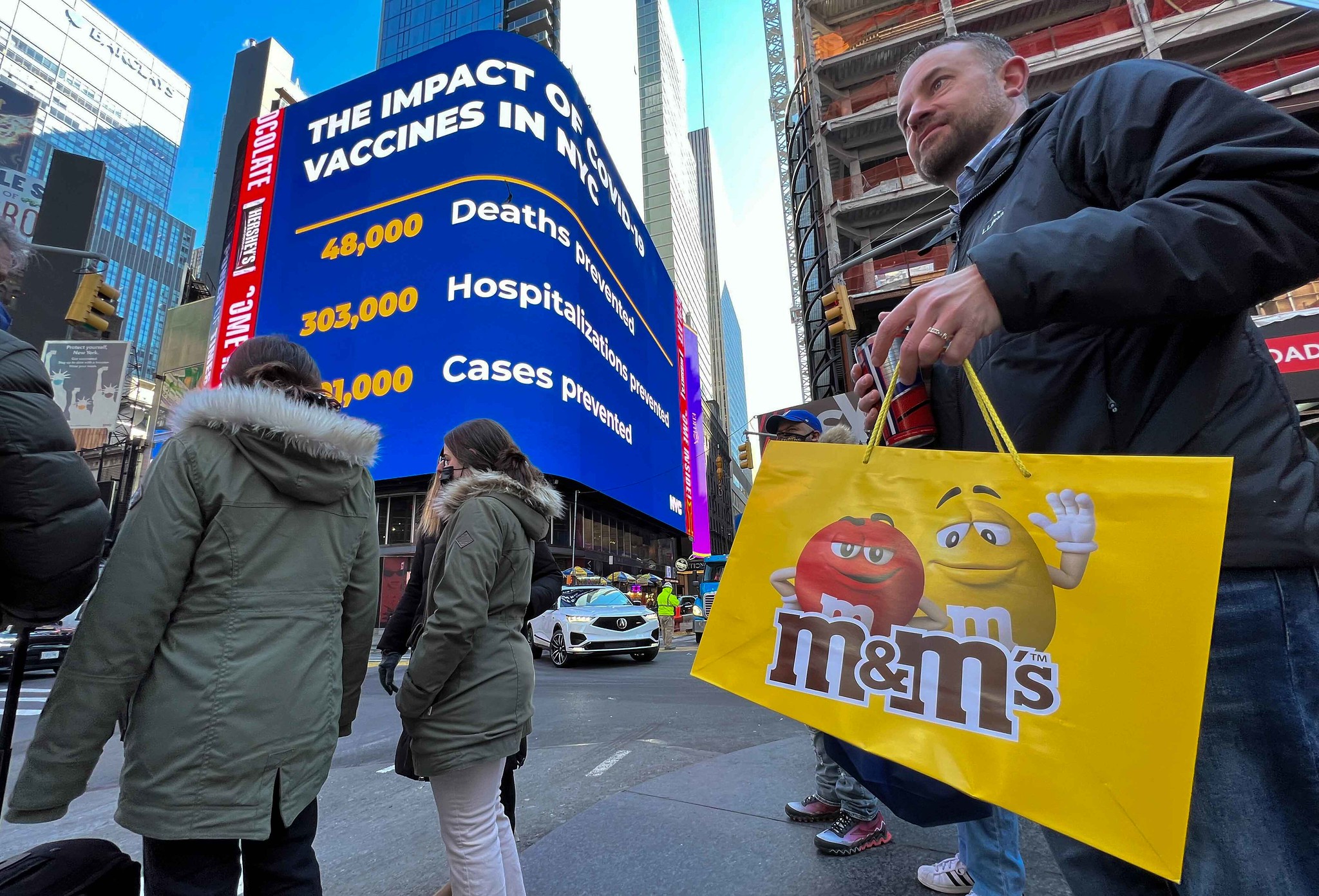 New York City removed its vaccine passport for most business and dropped mask mandates on Monday, March 7, 2022. This photo was taken Friday, March 4 in Times Square.