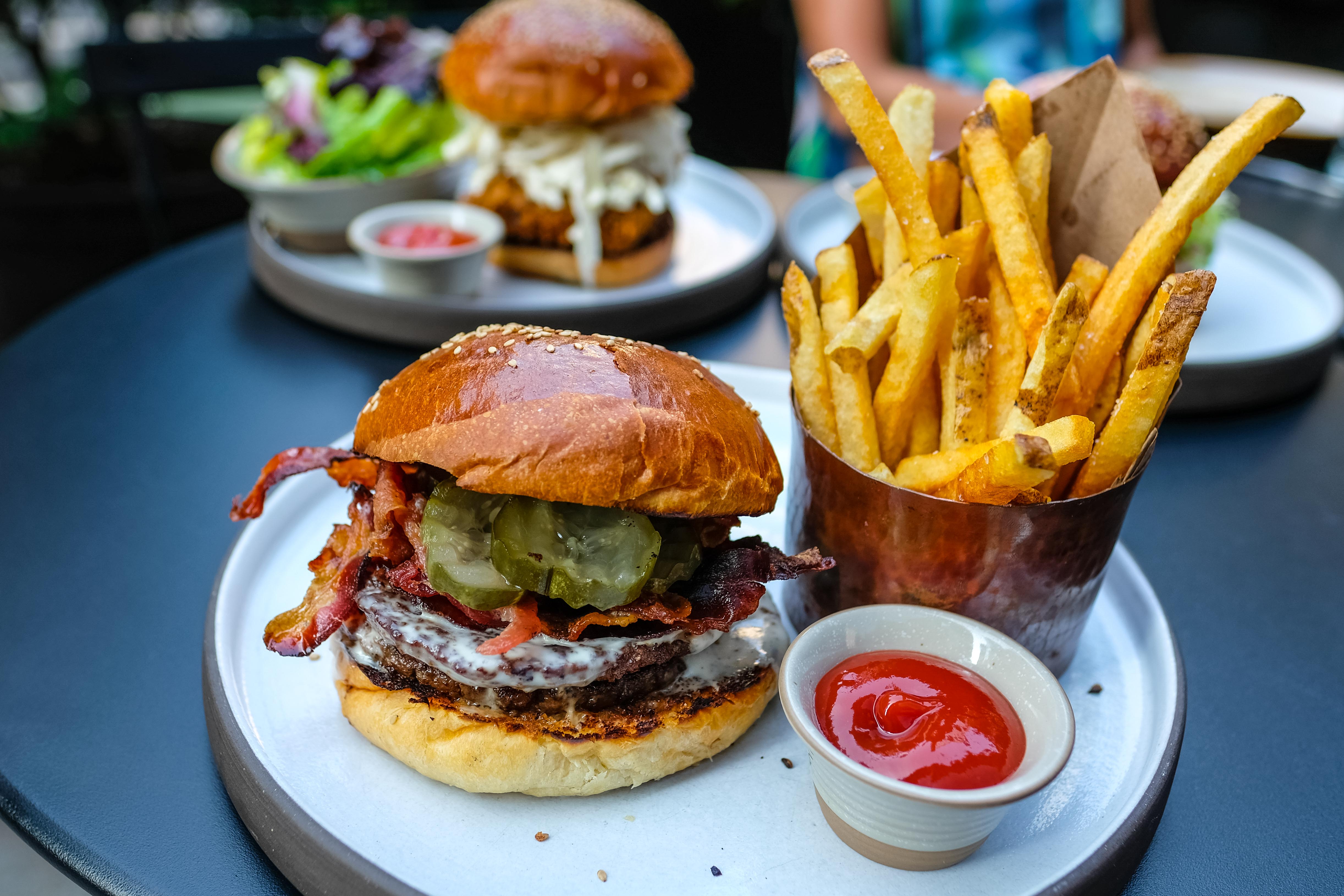 The Breslin At The Ace Hotel Reopens As A Burger Joint