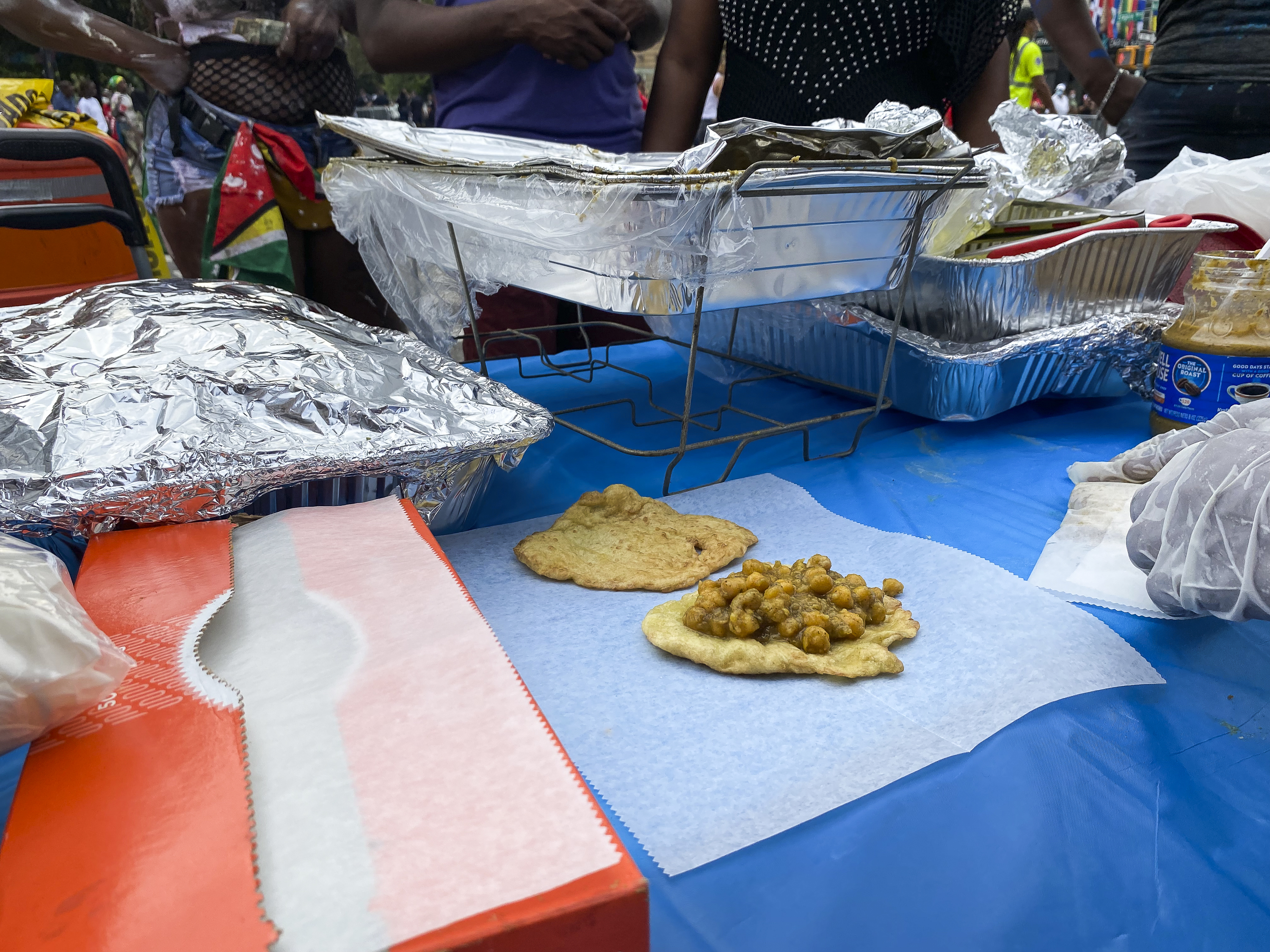 Eating down the road: Iconic Caribbean foods line Brooklyn streets as J’Ouvert returns