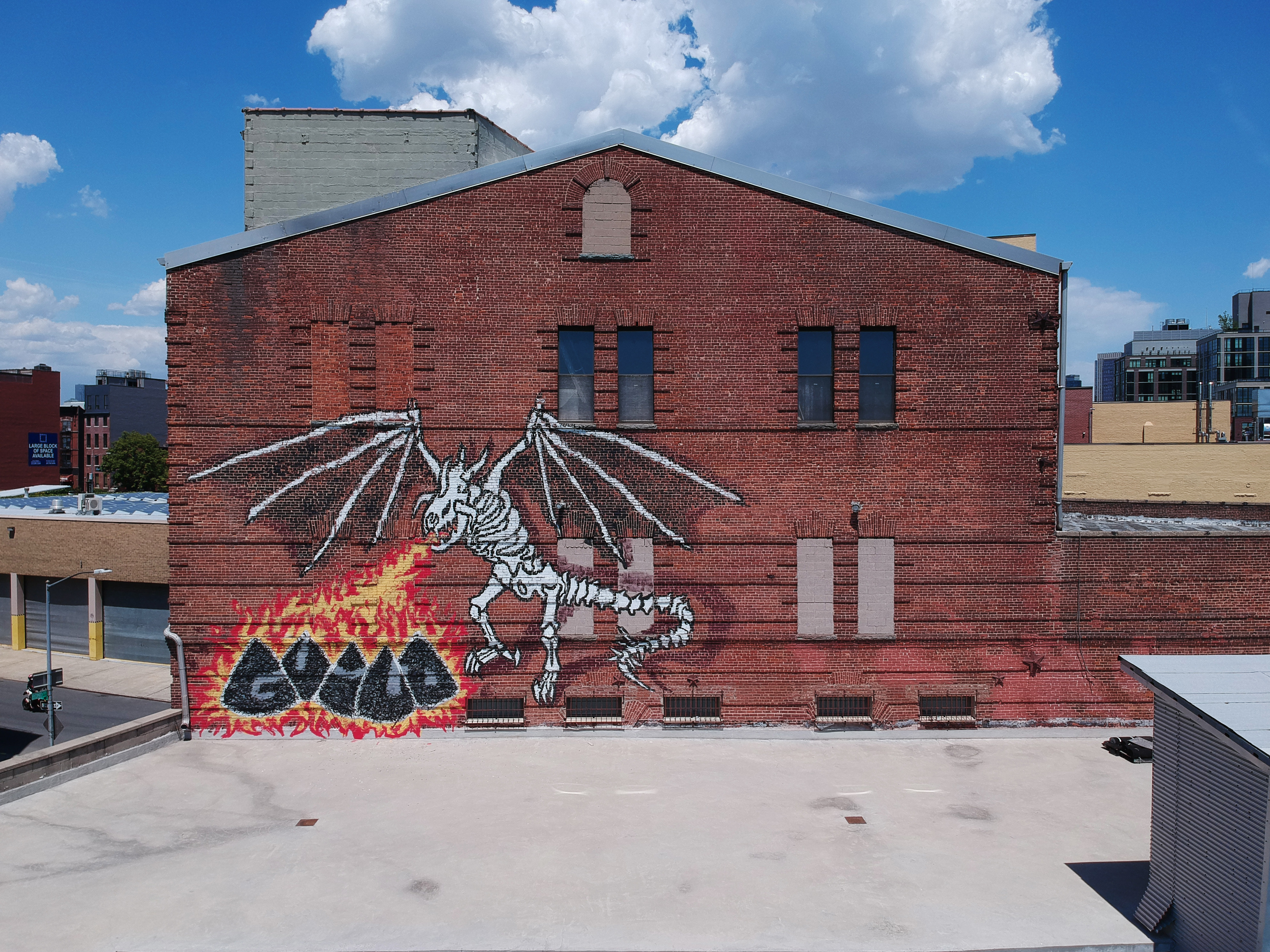 graffiti on a brick building in Gowanus