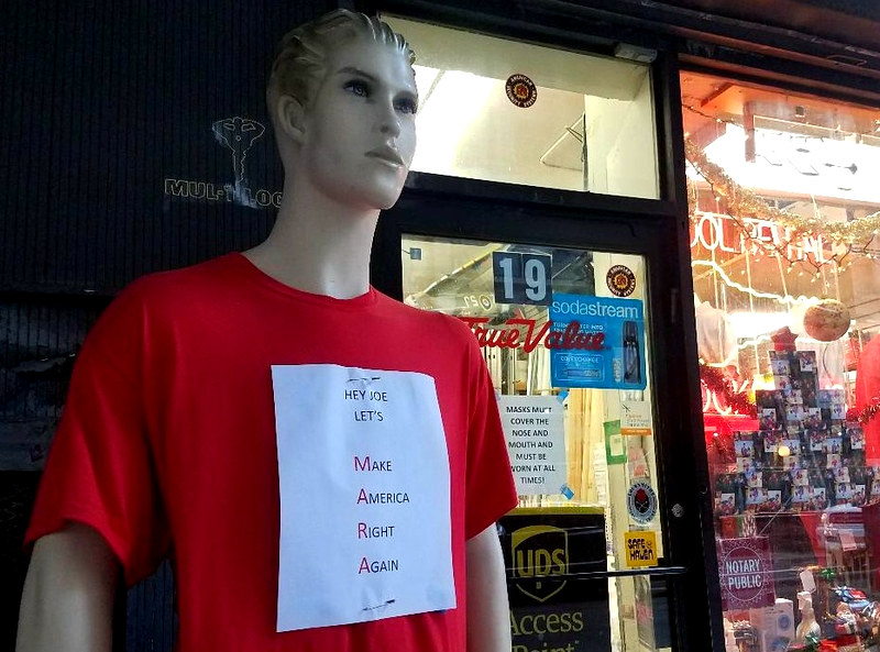 A mannequin in a red t-shirt with a sign pinned to the shirt that reads "Hey Joe, Let's Make America Right Again"