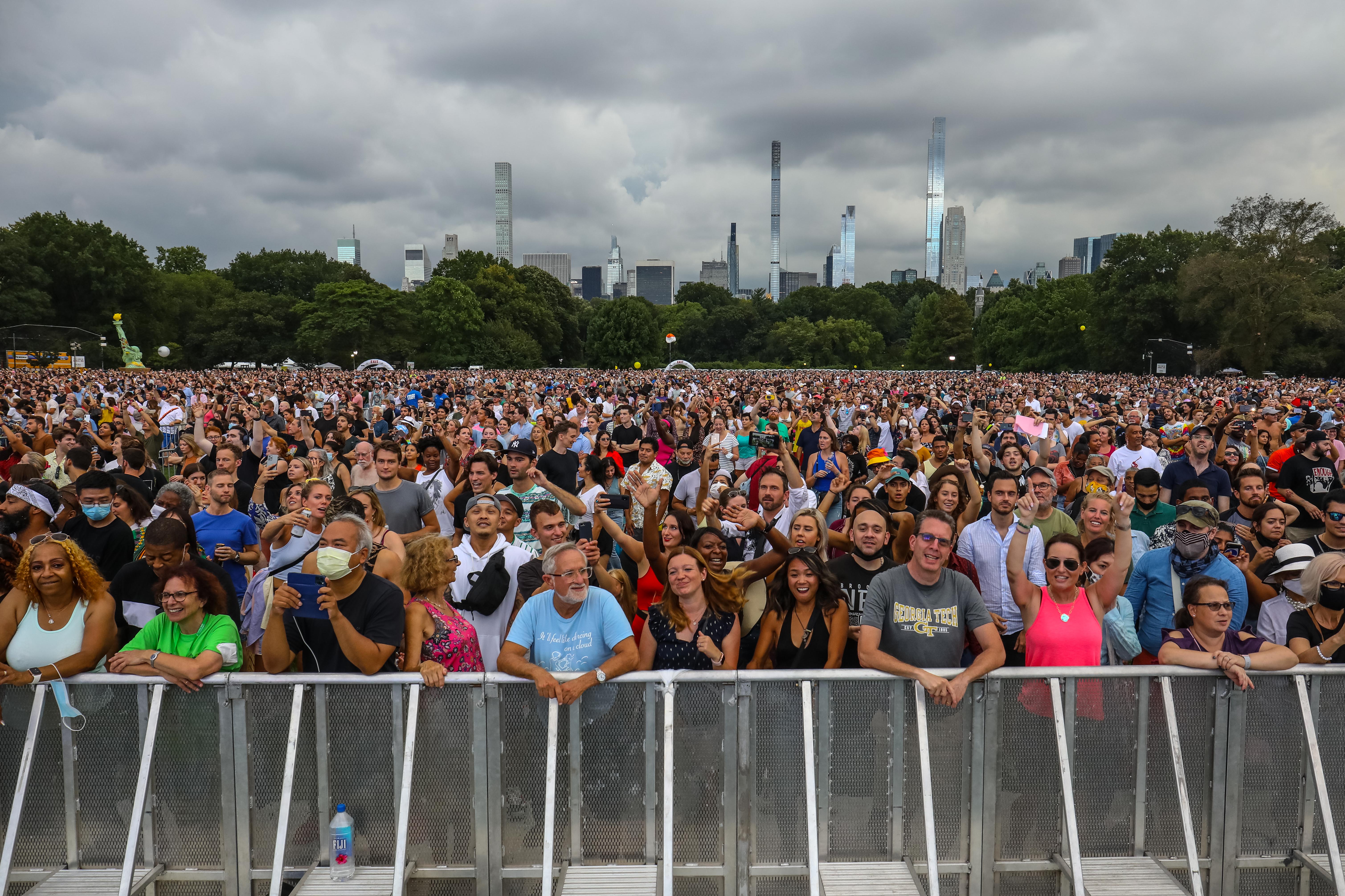 spectators at the Homecoming concert in Central Park, before the storm