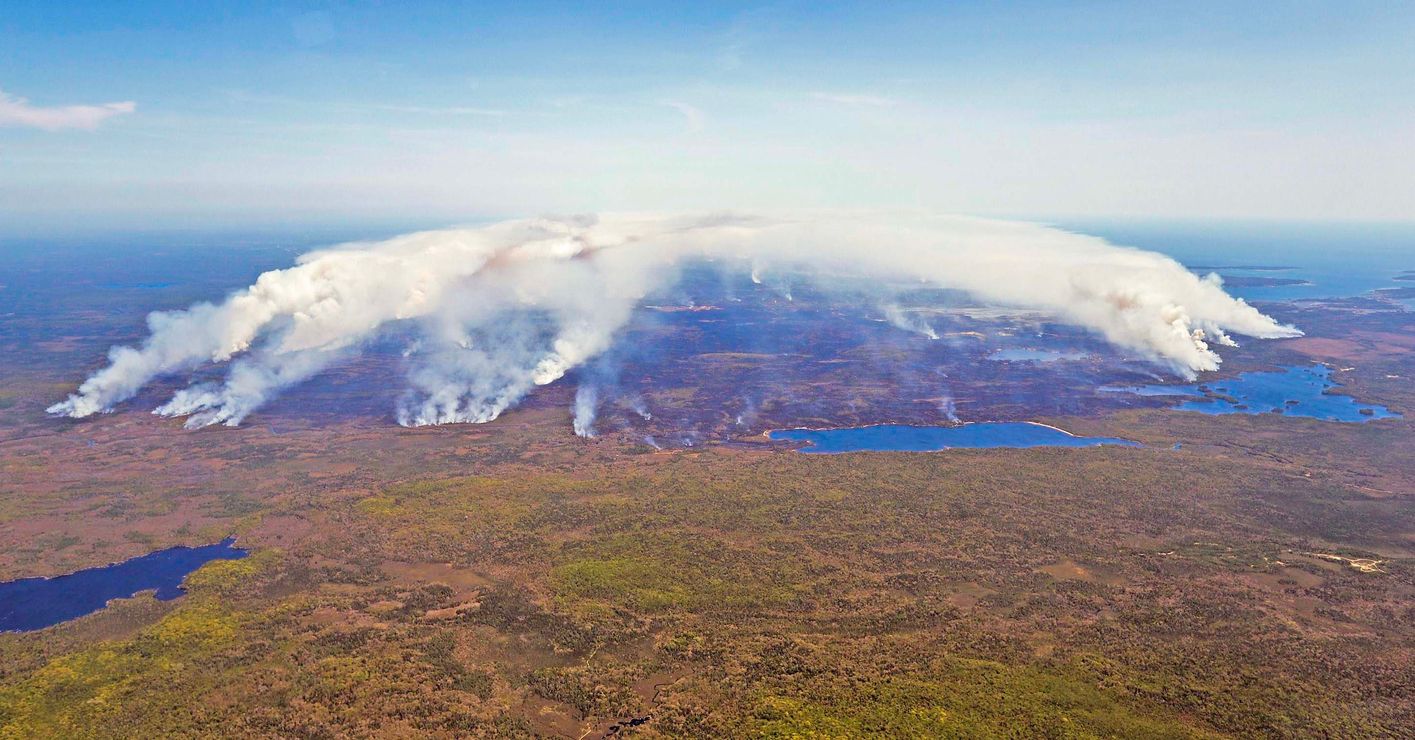 Aerial photo taken on May 31, 2023 shows wildfires in Shelburne County, Nova Scotia, Canada. An emergency official said this week that wildfires had burned an area equal to over 5 million football fields in Canada so far this year.