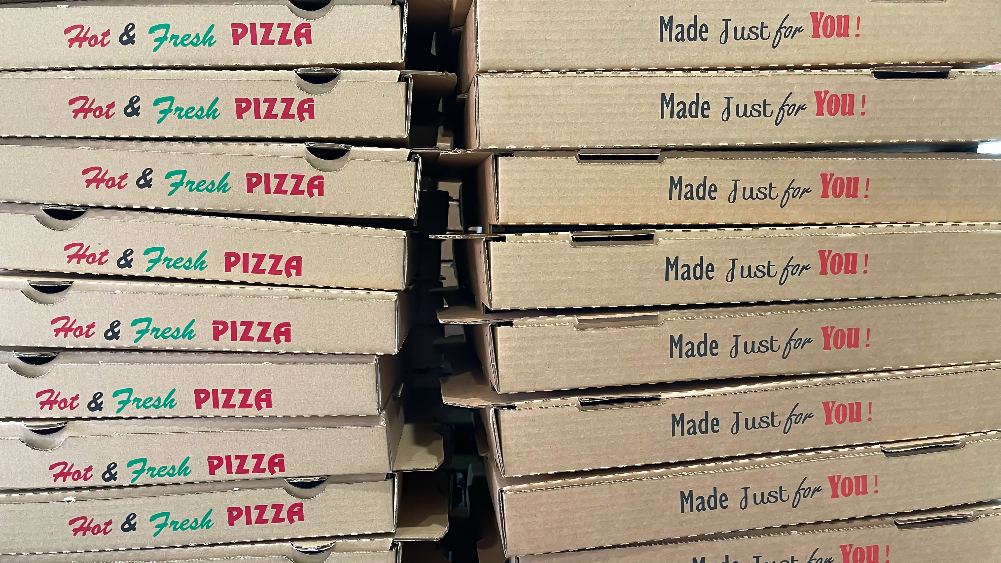 stacks of pizza boxes