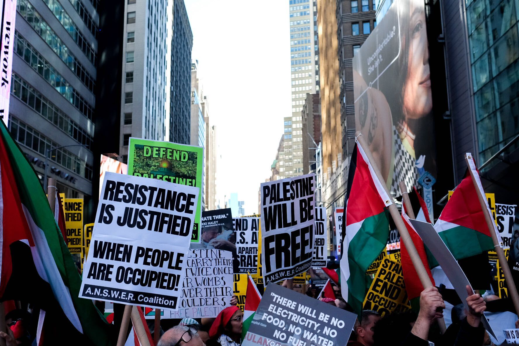 Demonstrators gather in Times Square for a rally in support of Palestinians Demonstrators gather in Times Square for a rally in support of Palestinians