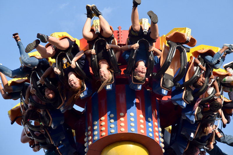 people upside down on a ride at Coney Island