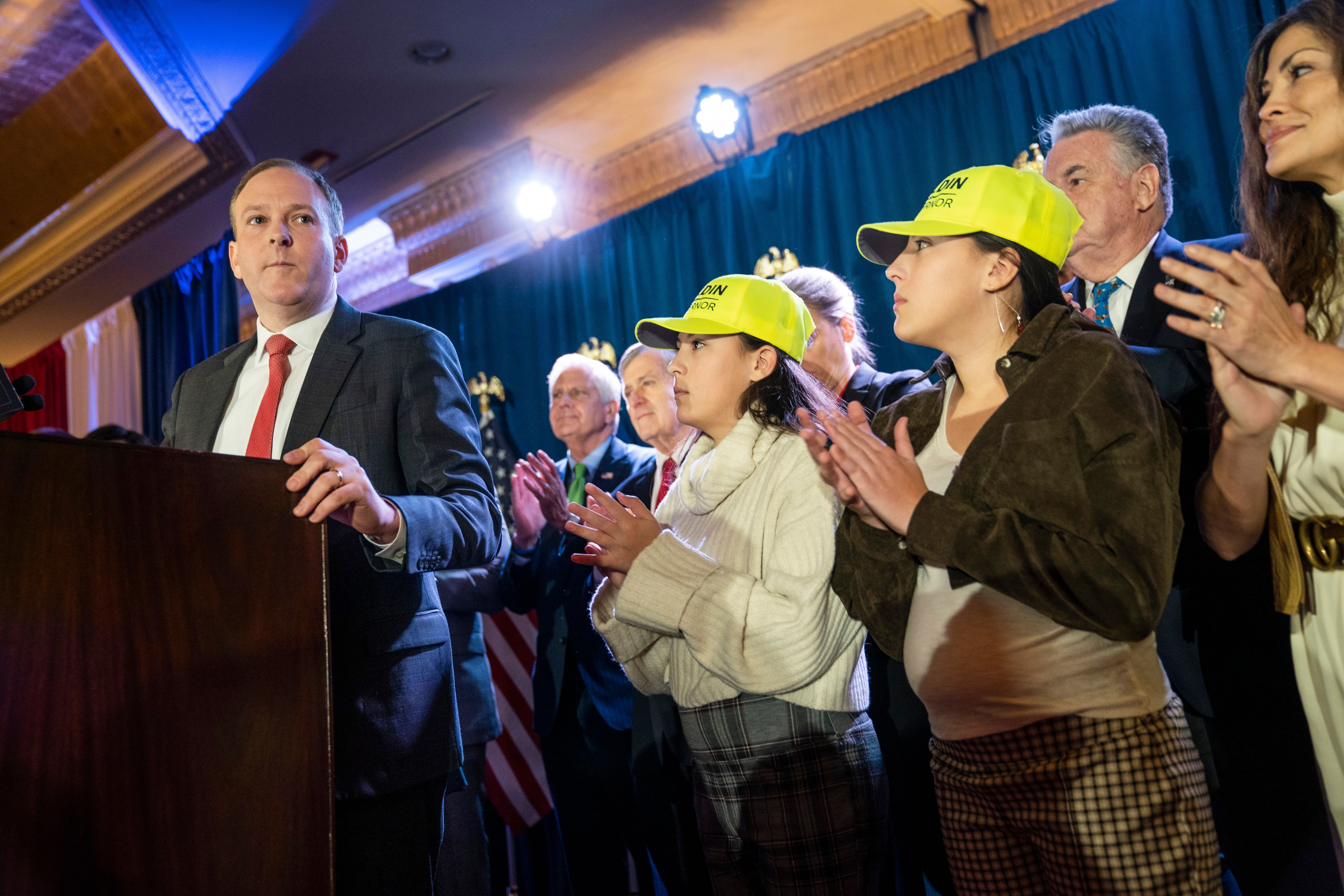 Rep. Lee Zeldin receives applause from supporters and his family as he speaks to delegates and assembled party officials at the 2022 NYGOP Convention, in Garden City, N.Y.