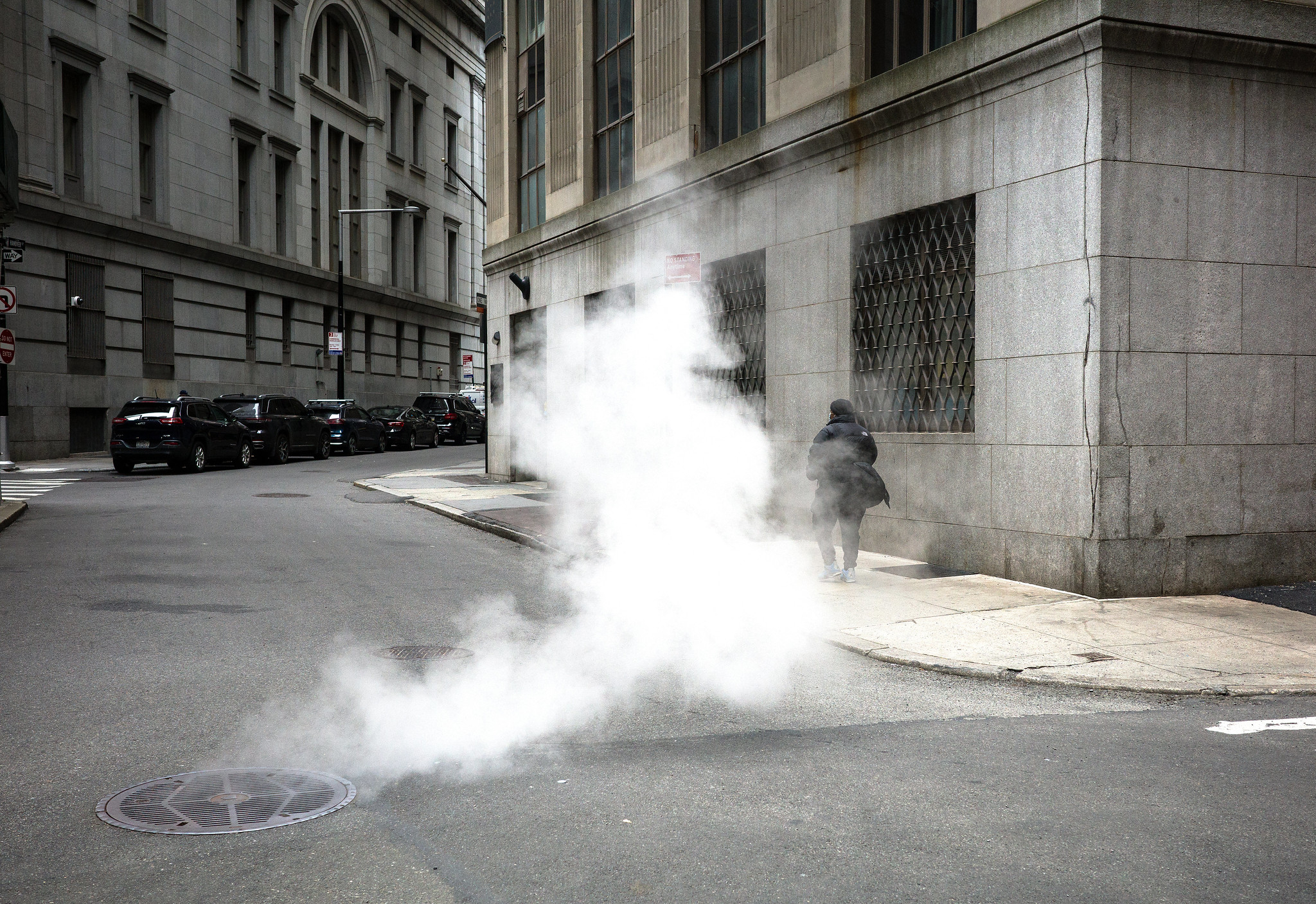 steam coming out of a manhole cover in Manhattan