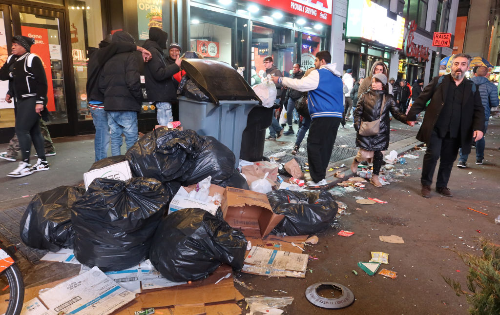 trash piled up in Times Square